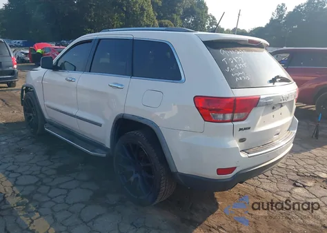 2012 Jeep Grand Cherokee Overland из США, поврежденный, VIN 1C4RJECT6CC215375